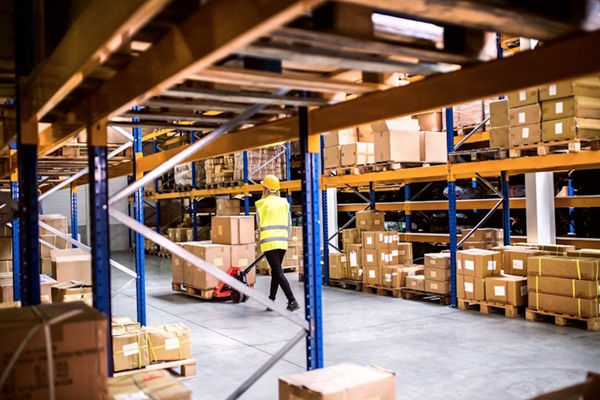 A warehouse filled with cardboard boxes.